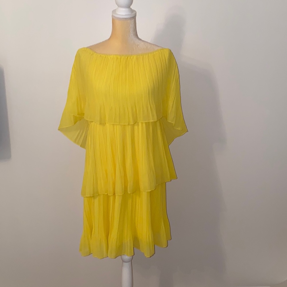 Two dresses with ruffles